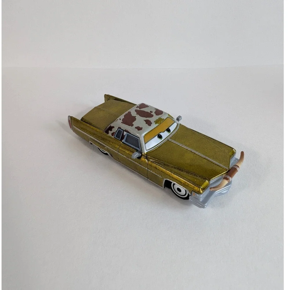 Disney Pixar Cars Tex Dinoco Gold Cadillac Diecast Toy Car Longhorns Mattel